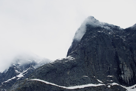 The Troll Wall in Norway, magestic summer foggy mountainsの写真素材