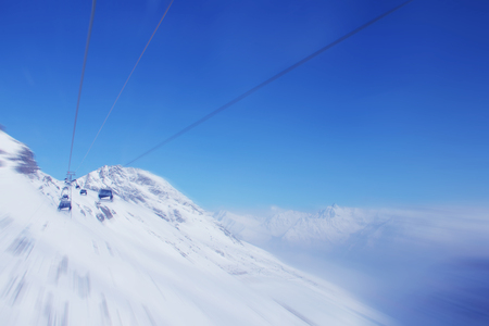 Ski lift with cabins in mountains of Austria