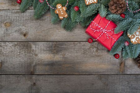 Christmas or New Year background composition made of Xmas decorations gingerbread cookies and fir...