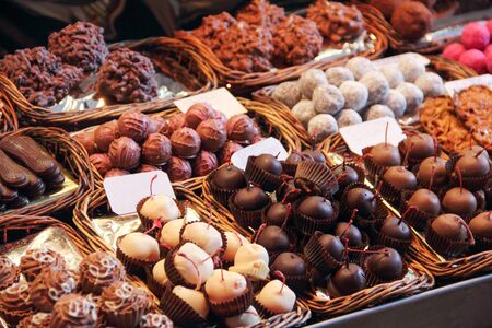 Sweet chocolate candy market .Confectionery at Boqueria market place in Barcelona, Spain. Assorted chocolate candy shop with variation of candiesの写真素材