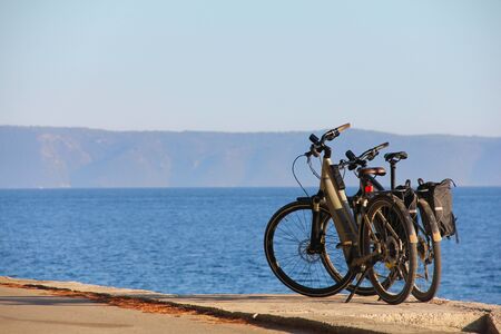 Two bicycles near the sea summer travel vacation concept