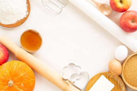 Autumn baking background border frame design with copy space for text. Cooking ingredients pumpkin,...