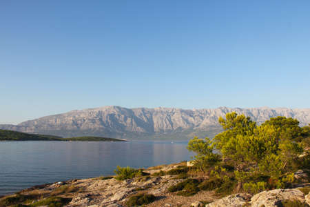 Turquoise sea water of beach and mountains, Sumartin, Brac island, Croatiaの写真素材