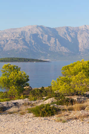 Turquoise sea water of beach and mountains, Sumartin, Brac island, Croatiaの写真素材