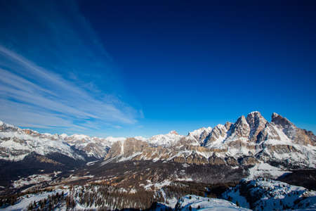 Dolomities Dolomiti Italy in wintertime beautiful alps winter mountains and ski slope Cortina d'Ampezzo Faloria skiing resort areaの写真素材