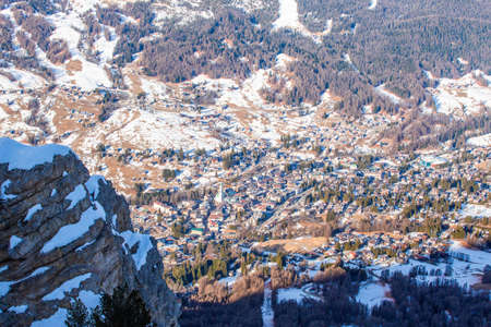 Cortina d'Ampezzo winter city view from Faloria ski area, ski resort in Italy. Cortina, Regina delle Dolomiti, Queen of the Dolomites, Dolomites mountainsの写真素材
