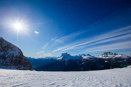 Dolomities Dolomiti Italy in wintertime beautiful alps winter mountains and ski slope Cortina d'Ampezzo Faloria skiing resort areaの写真素材