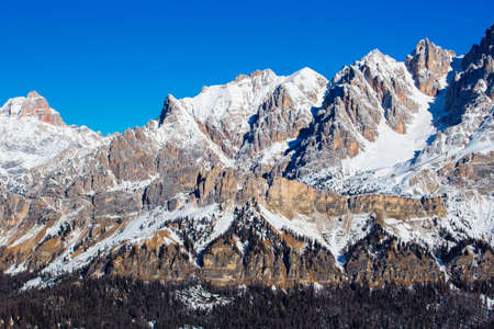 Dolomities Dolomiti Italy in wintertime beautiful alps winter mountains and ski slope Cortina d'Ampezzo Faloria skiing resort areaの写真素材