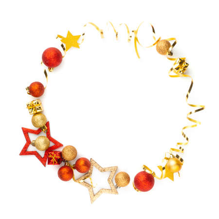 Christmas conceptual wreath frame made of colored bright golden christmas balls isolated on white background. Top view flat lay.の写真素材