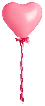 Pink heart as air balloon with tied bow and curly silk isolated on white backgroundの写真素材