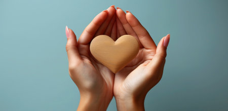 Person Holding Heart-Shaped Cookieの素材