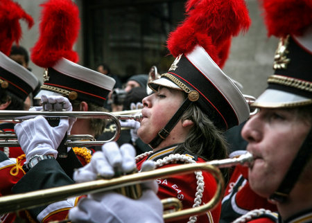 London, United Kingdom - January 01, 2007: Unknown member of Wauwatosa East high school marching band playing trumpet during their performance at London's New Year parade.のeditorial素材