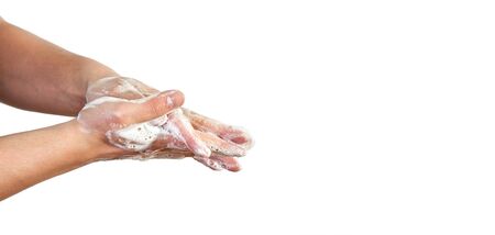 Young man wash hands with soap, closeup detail on soap bubbles, isolated on white, space for text...