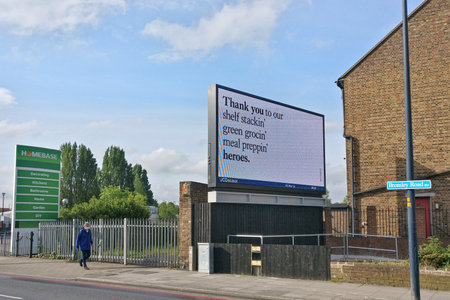 London, United Kingdom - May 04, 2020: Display advertisement with thank you note to essential workers displayed at Lewisham high street, during coronavirus covid-19 outbreakのeditorial素材