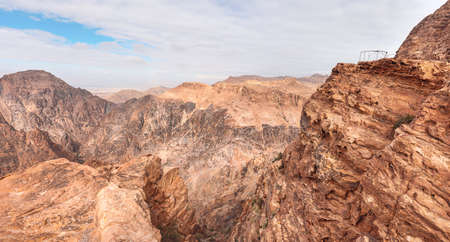 View to rocky landscape from viewpoint near Ad Deir The Monastery in Petra, Jordanの写真素材