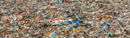 Various garbage on landfill site baner
