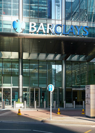 London, United Kingdom - February 03, 2019: Blue Barclays logo at their worldwide headquarters in Canary Wharf. It is British multinational investment bank, one of largest world banks.のeditorial素材