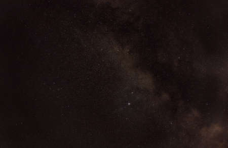 Night sky with many stars in area near constellations Sagitta, Vulpecula and Delphinus. Brightest...