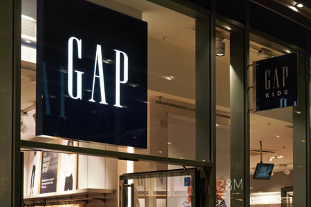 London, United Kingdom - February 01, 2019: Neon sign at entrance to GAP store of their branch in Oxford Street. Gap Inc is american clothes and accessories brandのeditorial素材