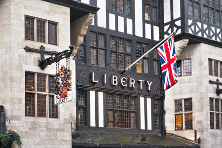 London, United Kingdom - February 01, 2019: Sign on Tudor stylised building Liberty's. It's department store in Great Marlborough Street selling clothes and accessories. Liberty was founded 1875のeditorial素材