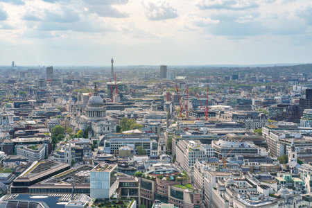 Aerial view of west London on a sunny day, classic St. Pauls cathedral amongst many modern buildingsの写真素材
