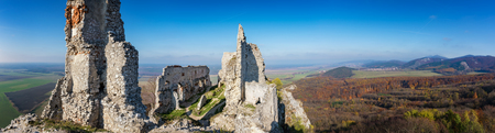 Abandoned ruins of medieval Plavecky castle in autumnの写真素材