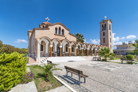 Orthodox church of Saint Nektarios with bell tower in Faliraki (Rhodes, Greece)の写真素材