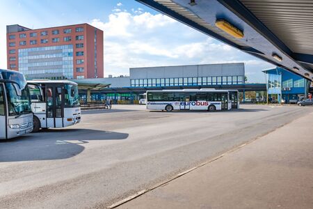 KOSICE, SLOVAKIA â MAY 1 2019: Buses parked near platforms with shelters at Main bus station in Kosice (Slovakia)のeditorial素材