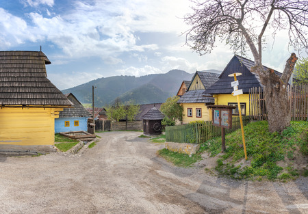 Colourful traditional wooden houses in mountain village Vlkolinec- UNESCO (SLOVAKIA)のeditorial素材