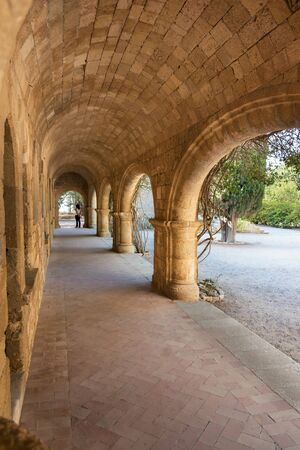 Column corridor with icons of Saints in Monastery of Filerimos on Acropolis of Ialyssos (Rhodes, Greece)の写真素材