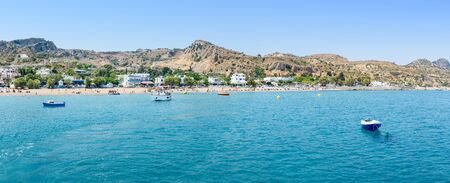 Panoramic view of Stegna beach with anchored small boats (RHODES, GREECE)の写真素材