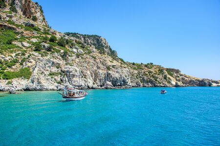 Boat trip in Mediteranean sea near coast of island of Rhodes (Rhodes, Greece)の写真素材