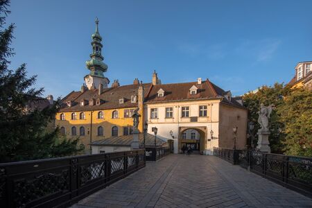 St. Michael`s Bridge, Bratislava, Slovakia. A small pedestrian bridge over a summer reading garden.のeditorial素材