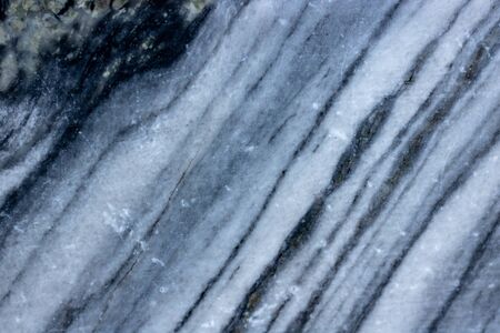 Raw natural striped marble with a background texture pattern