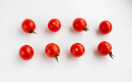Cherry tomatoes isolated on a white background. The view from the top. the concept of harvest.の写真素材