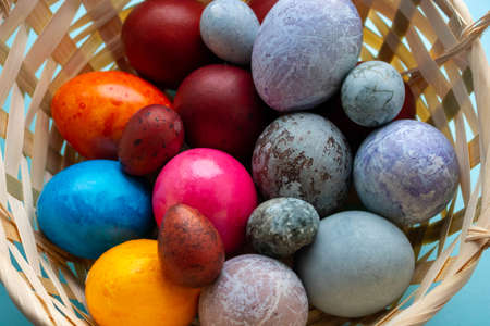 Basket with colorful Easter eggs.The Concept Of Easter.