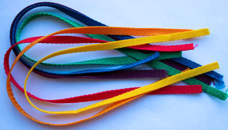 LGBT rainbow ribbon on a white background.