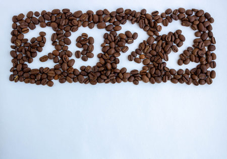 The numbers 2022 on the background of coffee beans. New Year's Eve 2022. New Year's calendar.