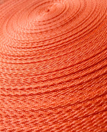 Orange abstract background. Circular pattern of orange sling.の写真素材