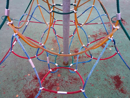 Multi-colored variety and group of ropes for climbing on the playgroundの写真素材