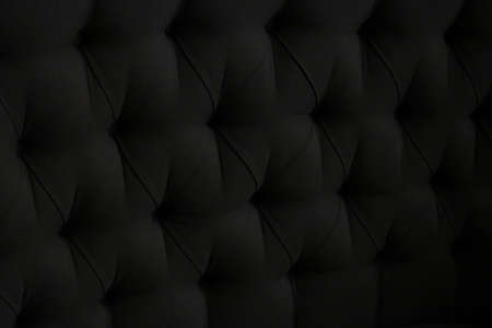 Black velor background with quilted upholstery in Chesterfield style close-up.の写真素材