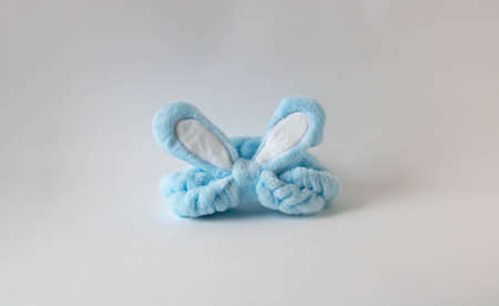 Blue headband for hair with rabbit ears. Easter Concept.