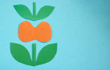 Thyroid day.The shape of the thyroid gland on a blue background.Place for your text.