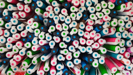 Abstract background of multicolored caps of plastic pens. A set of several liners, markers and colored markers of different colors, top view.の写真素材