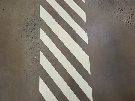 The store has a concrete gray floor with white markings.の写真素材