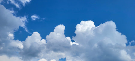 Cloudscape - Blue sky and white clouds, wide panorama