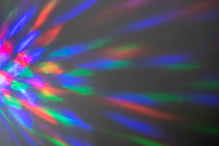 Beautiful multicolored geometric patterns on a dark background.の写真素材