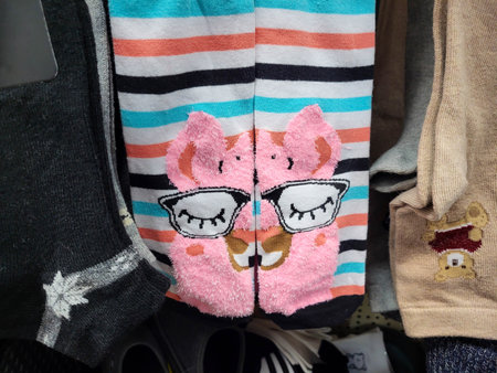 Cute fashion striped socks with a pink llama in glasses patternの写真素材