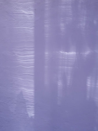 Lilac plastered wall in the room. Abstract texture for design.の写真素材