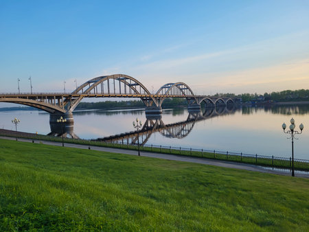 A road and pedestrian bridge over the Volga River in the city of Rybinsk, Yaroslavl Regionの写真素材